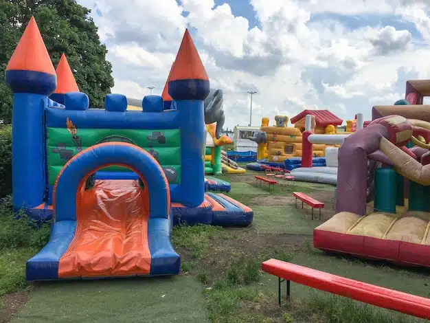 Bouncy castles set up outdoors near Buenaventura Lakes, Florida